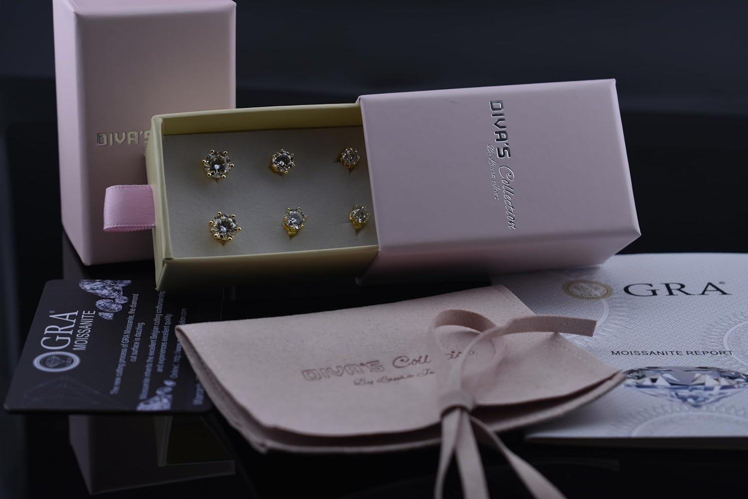 DIVA'S jewelry box package moissanite diamond-shaped 3 pairs earrings with different carat weights brilliant 925 sterling silver 14k yellow gold plate black background with GRA certificate