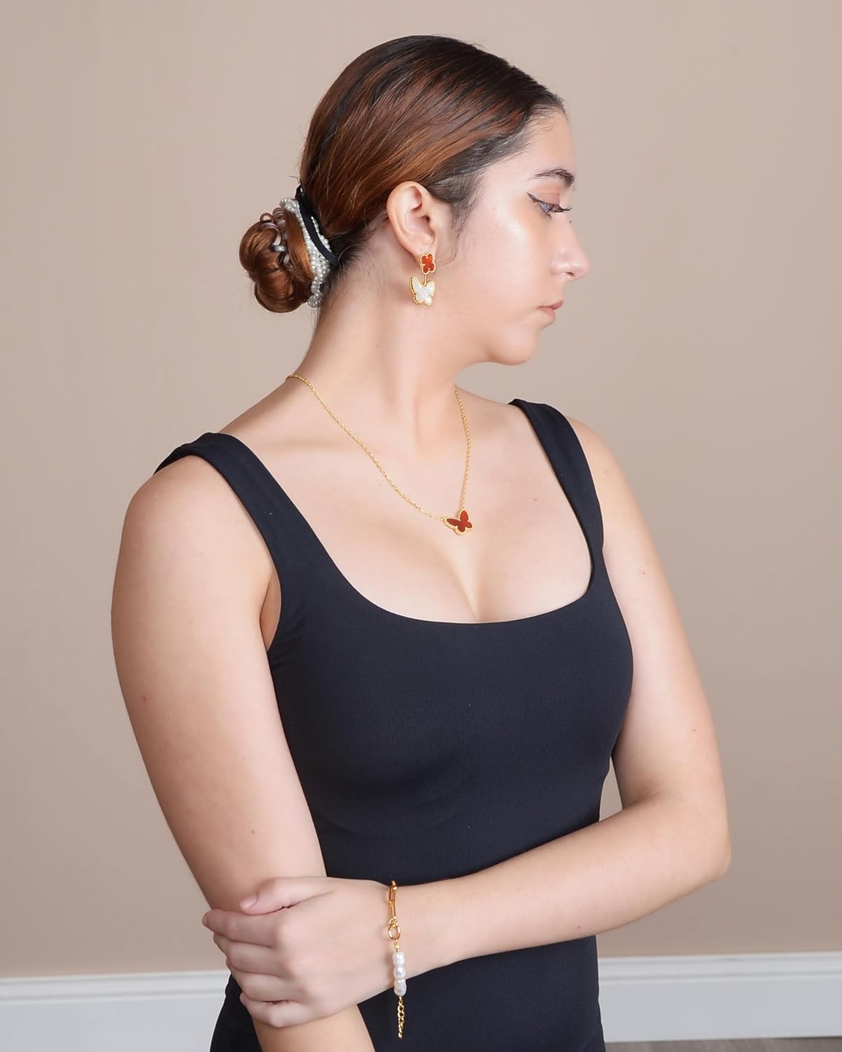 Diva's Women Link Bracelet and Cultured 6.5-7mm Freshwater Pearl Solid 925 Sterling Silver-18kt Gold Plated showing on person wrist wearing a black dress