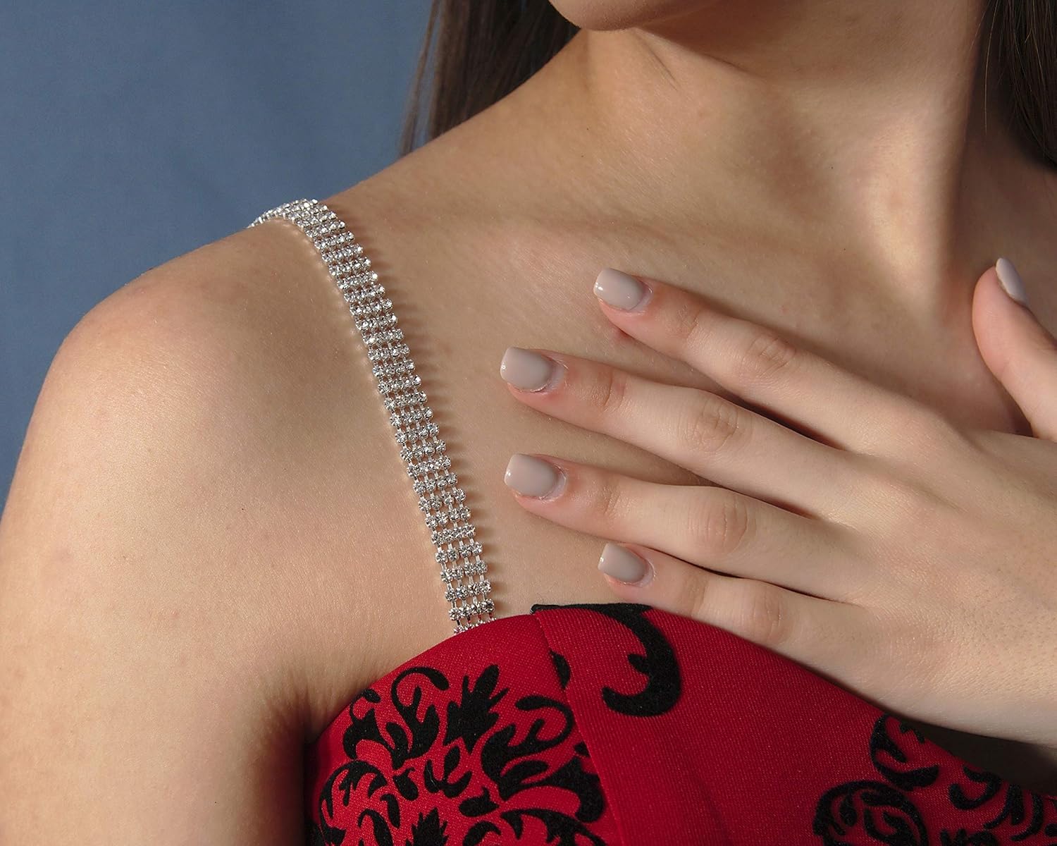Rhinestone Removable Crystal Silver Bra Straps on person wearing a black and red dress