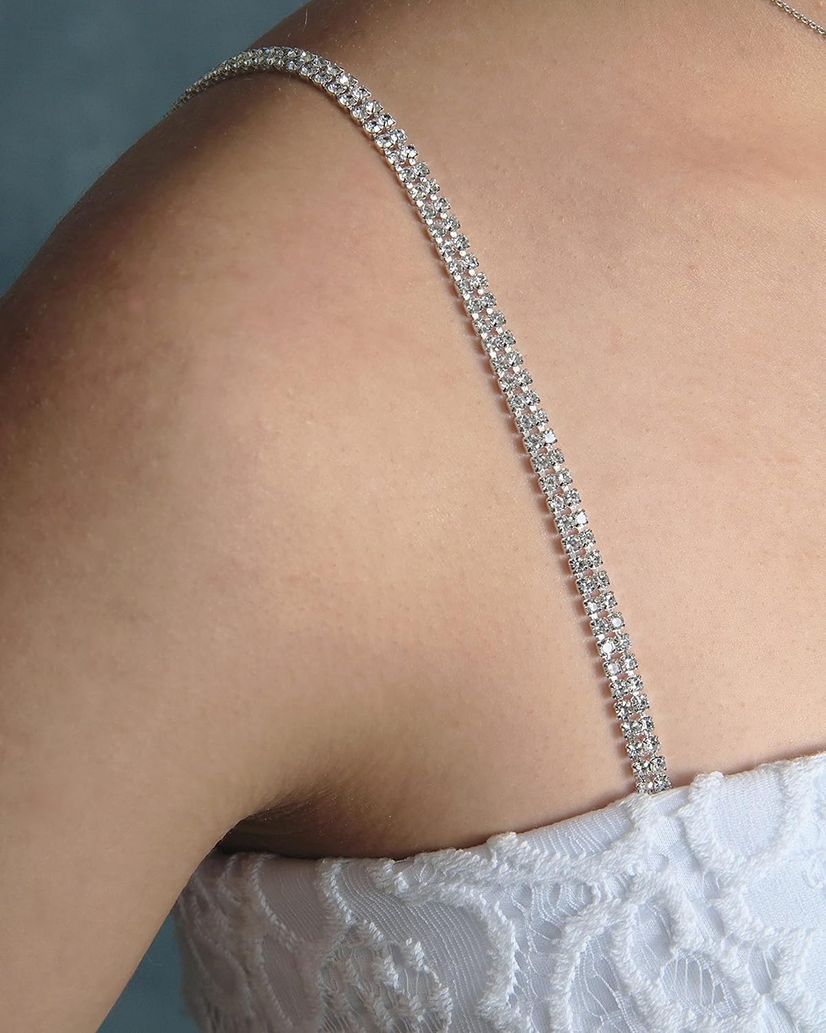 Rhinestone removable Silver Crystal Bra Straps, Multiple Sizes on person shoulders with white top dress