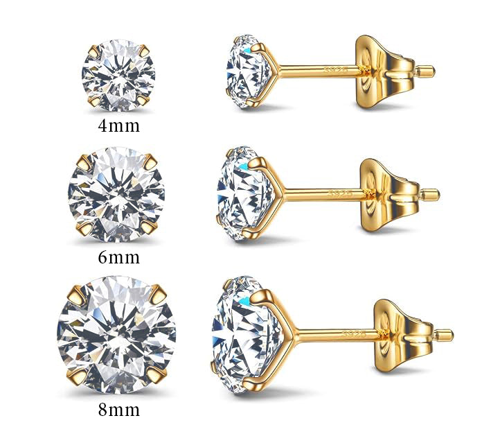 3 pairs stud earrings clear crystals with different carat weights brilliant 925 sterling silver 14k yellow gold plate on white background